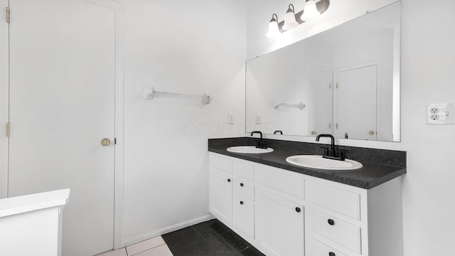 3099 Ambarwent Rd, Reynoldsburg, OH 43068 - full bath with double vanity and tile patterned flooring