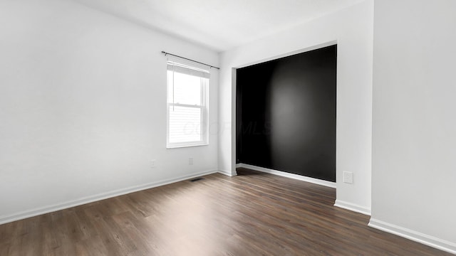 3099 Ambarwent Rd, Reynoldsburg, OH 43068 - unfurnished room featuring dark wood-style flooring and baseboards