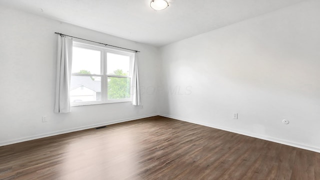 3099 Ambarwent Rd, Reynoldsburg, OH 43068 - empty room featuring dark wood finished floors and baseboards