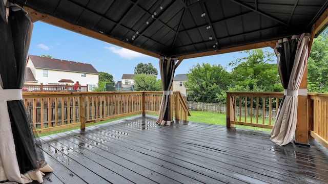 3099 Ambarwent Rd, Reynoldsburg, OH 43068 - wooden terrace with a fenced backyard, a gazebo, and a residential view
