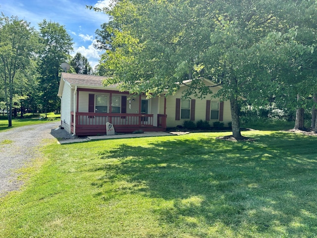 329 Floralwood Dr, Howard, OH 43028 - view of front facade featuring covered porch and a front lawn