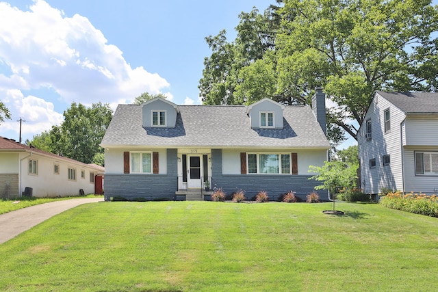 315 S Kellner Rd, Columbus, OH 43209 - cape cod house with a front lawn, roof with shingles, a chimney, and brick siding