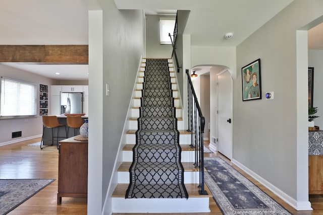 315 S Kellner Rd, Columbus, OH 43209 - staircase with arched walkways and wood finished floors