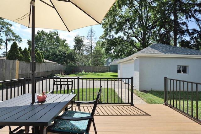315 S Kellner Rd, Columbus, OH 43209 - wooden deck with an outdoor structure, a garage, and outdoor dining space