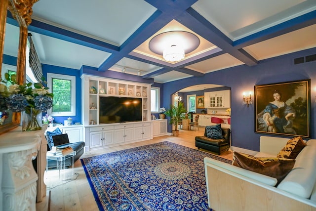 7394 Whitlind Ln, Athens, OH 45701 - living room featuring arched walkways, wood finished floors, coffered ceiling, and beamed ceiling