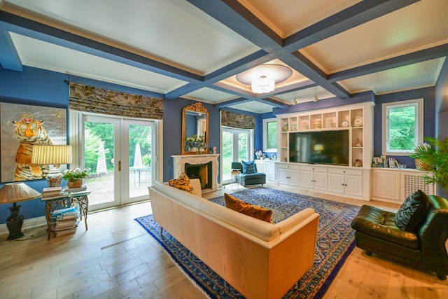 7394 Whitlind Ln, Athens, OH 45701 - living area with french doors, wood finished floors, plenty of natural light, beamed ceiling, and coffered ceiling
