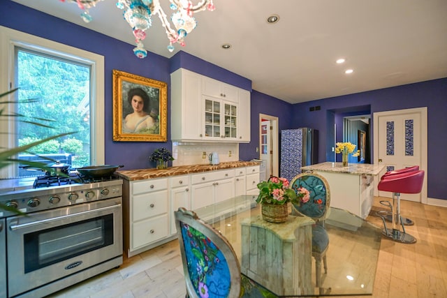 7394 Whitlind Ln, Athens, OH 45701 - dining room with recessed lighting and a chandelier