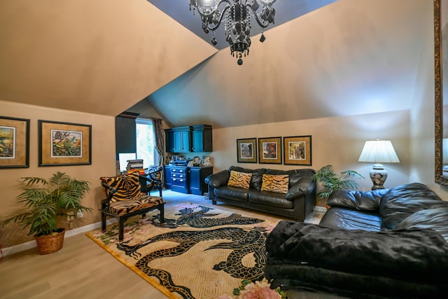 7394 Whitlind Ln, Athens, OH 45701 - living area with a chandelier, wood finished floors, and vaulted ceiling