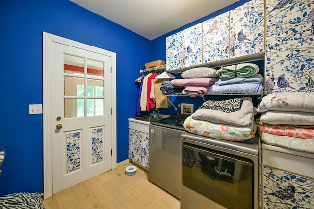 7394 Whitlind Ln, Athens, OH 45701 - washroom featuring washing machine and dryer and wood finished floors