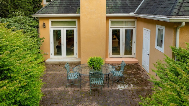 7394 Whitlind Ln, Athens, OH 45701 - view of patio with french doors and outdoor dining area