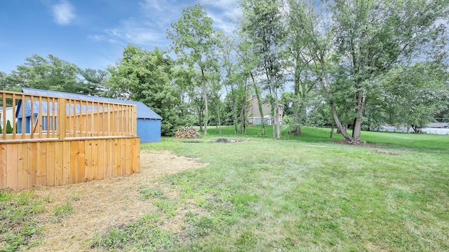 285 E Cherry St, Sunbury, OH 43074 - view of green lawn with view of wooded area