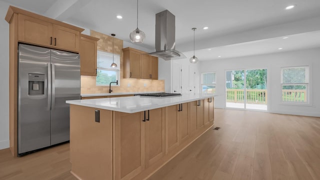 285 E Cherry St, Sunbury, OH 43074 - kitchen featuring stainless steel refrigerator with ice dispenser, island range hood, light wood-style flooring, plenty of natural light, and recessed lighting