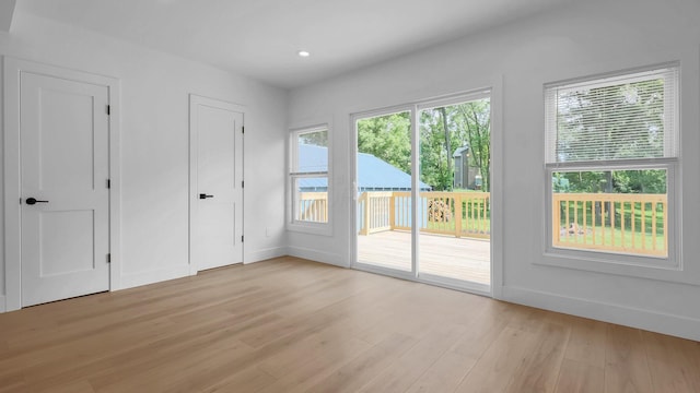 285 E Cherry St, Sunbury, OH 43074 - doorway to outside with healthy amount of natural light, light wood-style floors, and recessed lighting