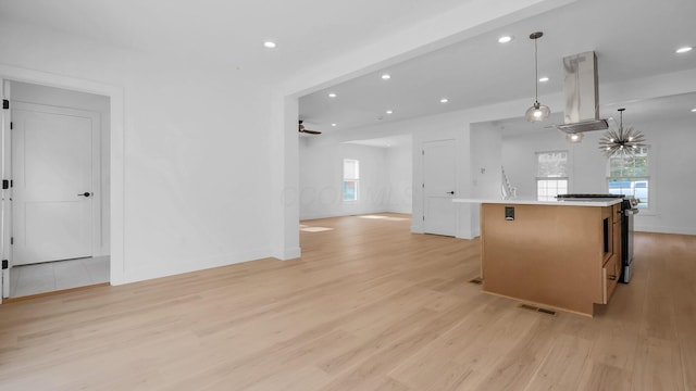 285 E Cherry St, Sunbury, OH 43074 - kitchen with open floor plan, light wood-style flooring, an island with sink, island range hood, and recessed lighting