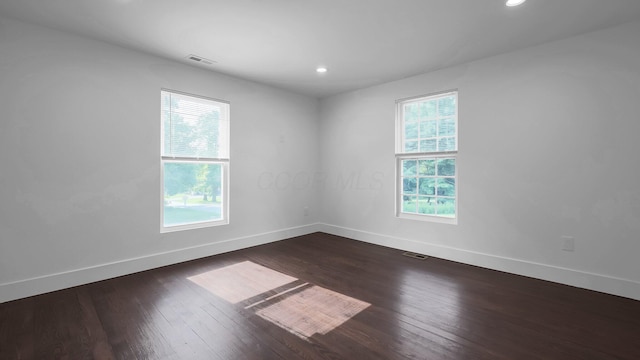 285 E Cherry St, Sunbury, OH 43074 - empty room with dark wood-type flooring and recessed lighting