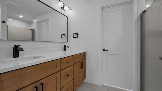 285 E Cherry St, Sunbury, OH 43074 - bathroom featuring double vanity and a shower stall