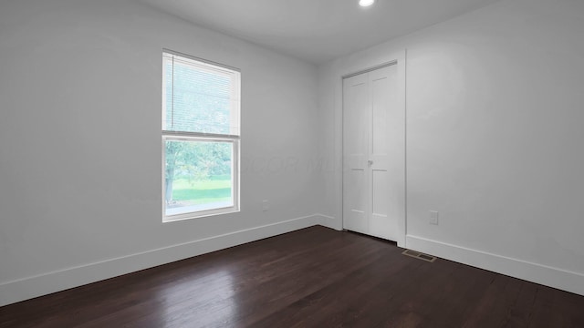 285 E Cherry St, Sunbury, OH 43074 - unfurnished room with dark wood-style flooring and recessed lighting
