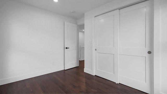 285 E Cherry St, Sunbury, OH 43074 - unfurnished bedroom featuring wood finished floors, a closet, and recessed lighting