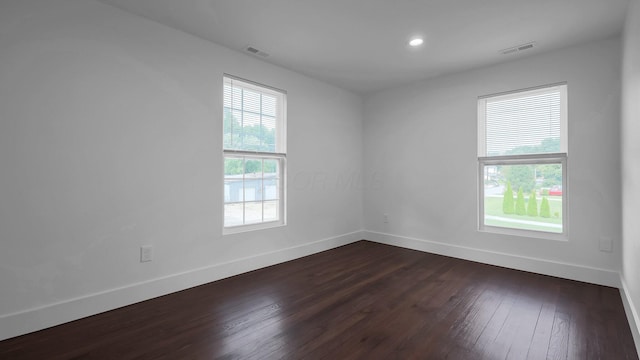285 E Cherry St, Sunbury, OH 43074 - empty room with dark wood-style flooring and recessed lighting