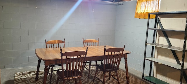 96 Summit St, Newark, OH 43055 - dining room featuring unfinished concrete floors and concrete block wall