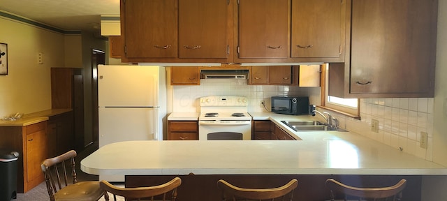 96 Summit St, Newark, OH 43055 - kitchen with white appliances, light countertops, extractor fan, a peninsula, and decorative backsplash