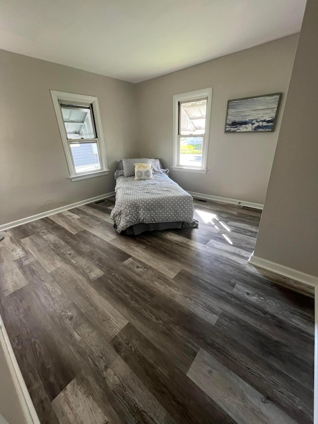 507 Broadway St, Washington Court House, OH 43160 - bedroom with multiple windows and wood finished floors