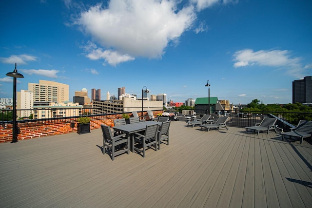 432 E Rich St Unit 3F, Columbus, OH 43215 - wooden terrace with a view of city and outdoor dining space