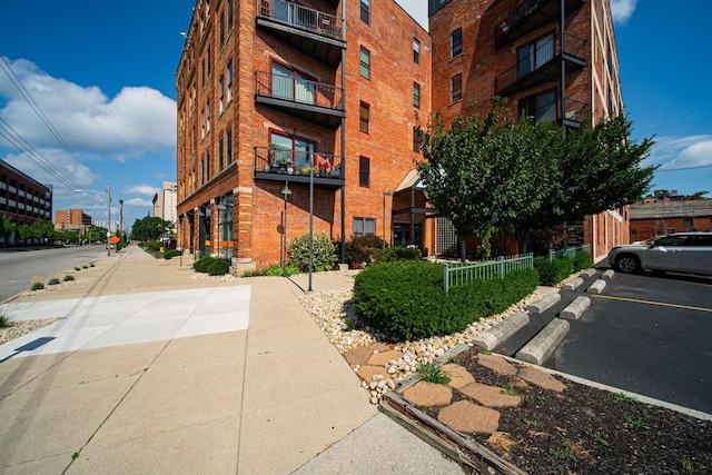 432 E Rich St Unit 3F, Columbus, OH 43215 - view of building exterior featuring uncovered parking