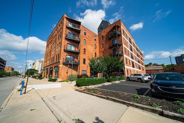 432 E Rich St Unit 3F, Columbus, OH 43215 - view of apartment building / complex featuring uncovered parking