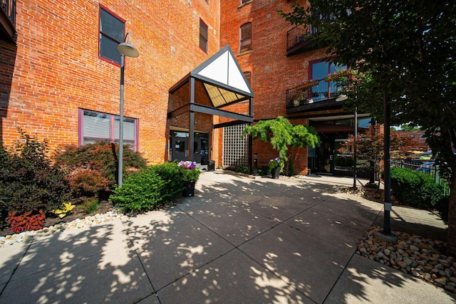 432 E Rich St Unit 3F, Columbus, OH 43215 - rear view of house featuring brick siding