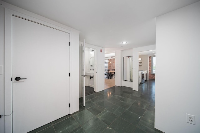 432 E Rich St Unit 3F, Columbus, OH 43215 - hall with recessed lighting and dark tile patterned flooring