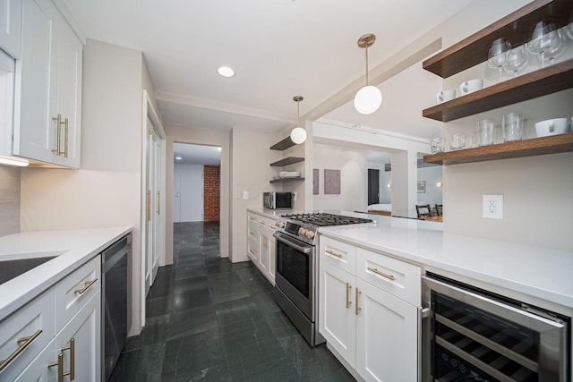 432 E Rich St Unit 3F, Columbus, OH 43215 - kitchen with appliances with stainless steel finishes, wine cooler, open shelves, light countertops, and white cabinetry