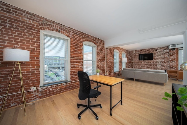 432 E Rich St Unit 3F, Columbus, OH 43215 - office space featuring brick wall and wood finished floors