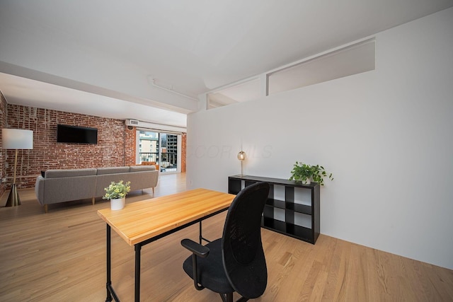 432 E Rich St Unit 3F, Columbus, OH 43215 - office space featuring brick wall and light wood-type flooring
