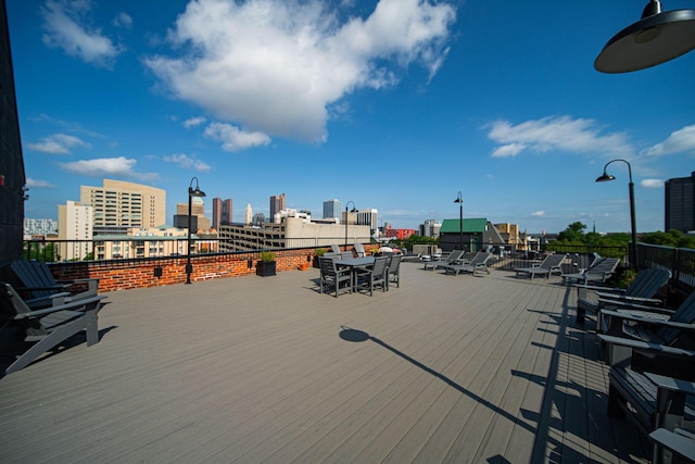 432 E Rich St Unit 3F, Columbus, OH 43215 - wooden terrace with a city view and outdoor dining space