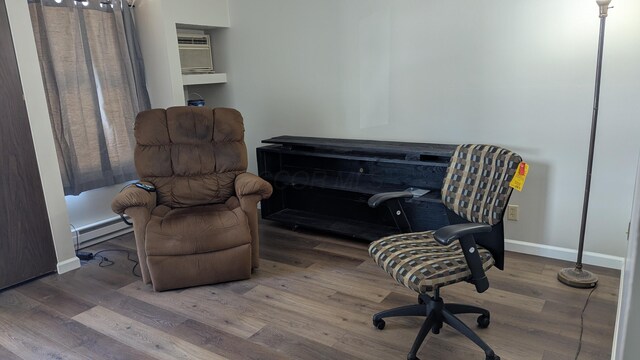 400 Forest Ln Unit 400, Richwood, OH 43344 - living area with a baseboard heating unit and wood finished floors