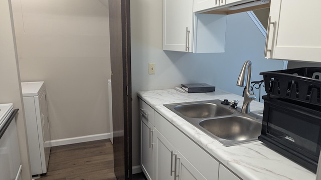 400 Forest Ln Unit 400, Richwood, OH 43344 - kitchen with washer / clothes dryer, white cabinets, dark wood finished floors, and light stone countertops