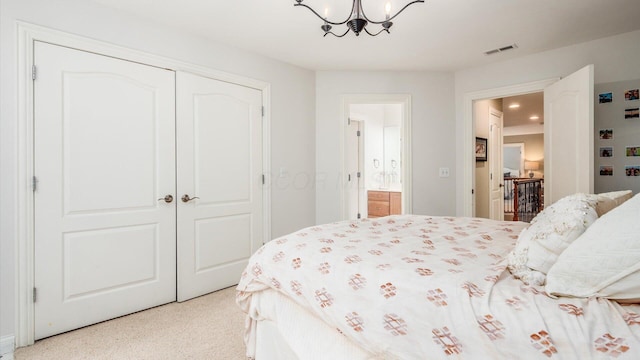 108 Hawks Cove Ct, Granville, OH 43023 - bedroom with a chandelier, a closet, recessed lighting, and carpet floors