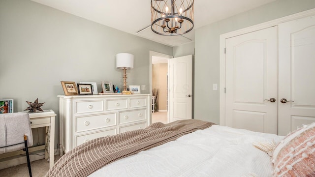 108 Hawks Cove Ct, Granville, OH 43023 - carpeted bedroom featuring a chandelier and a closet