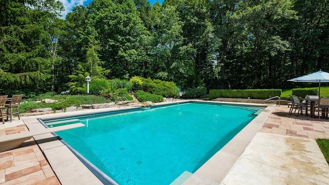 108 Hawks Cove Ct, Granville, OH 43023 - outdoor pool featuring outdoor dining area, a patio area, and a diving board