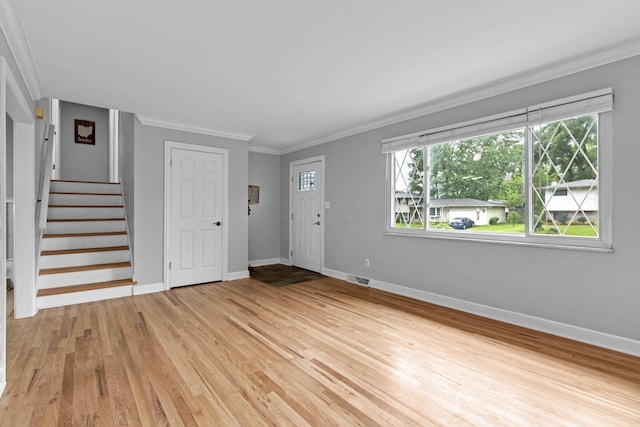 966 Larkstone Dr, Columbus, OH 43235 - foyer with light wood-type flooring, stairway, and ornamental molding