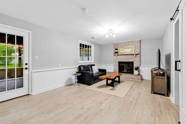 966 Larkstone Dr, Columbus, OH 43235 - living area featuring a fireplace and light wood-type flooring