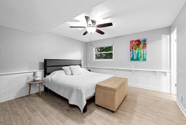966 Larkstone Dr, Columbus, OH 43235 - bedroom featuring wood finished floors, ceiling fan, and a textured wall