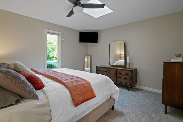 2500 Carriage Rd, Powell, OH 43065 - bedroom featuring light carpet, a skylight, and ceiling fan
