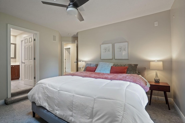 2500 Carriage Rd, Powell, OH 43065 - bedroom featuring light colored carpet, ensuite bath, and ceiling fan