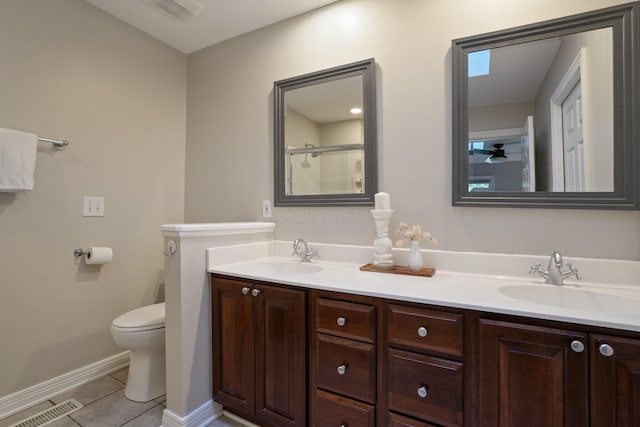 2500 Carriage Rd, Powell, OH 43065 - full bathroom with tile patterned flooring, double vanity, and an enclosed shower