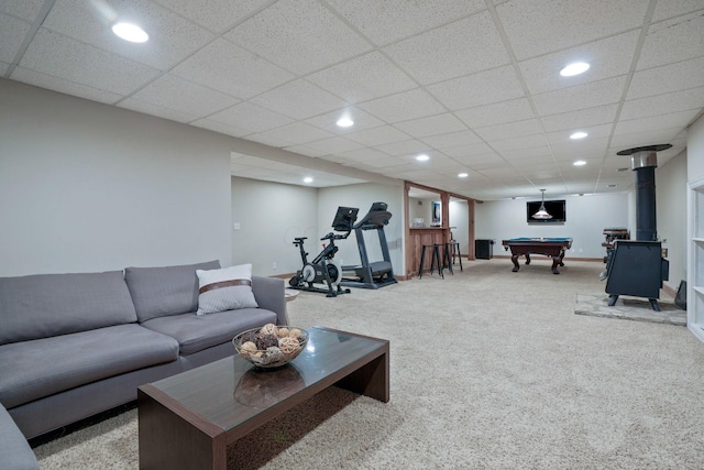 2500 Carriage Rd, Powell, OH 43065 - living room featuring carpet flooring, recessed lighting, pool table, a drop ceiling, and a wood stove
