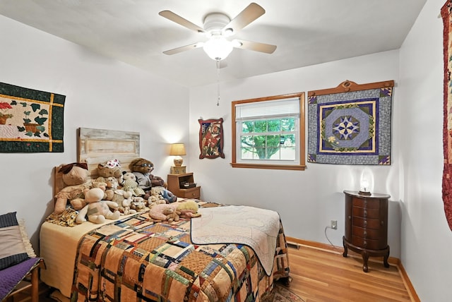 1994 County Road 61, Edison, OH 43320 - bedroom with light wood-style flooring and ceiling fan