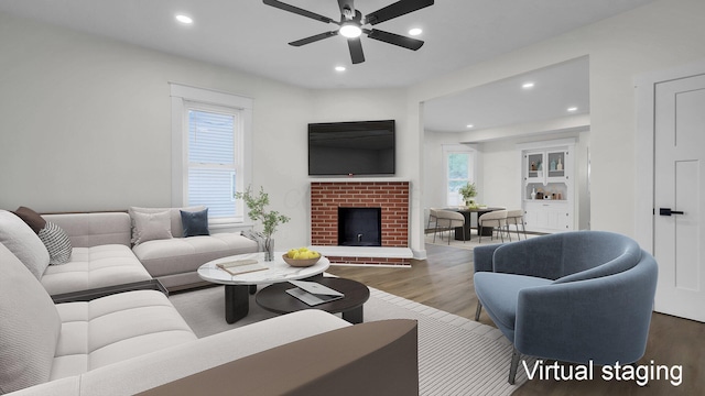732 Columbus Ave, Washington Court House, OH 43160 - living area with wood finished floors, a ceiling fan, recessed lighting, and a brick fireplace