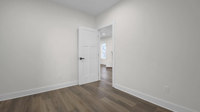 732 Columbus Ave, Washington Court House, OH 43160 - empty room featuring dark wood-type flooring and baseboards
